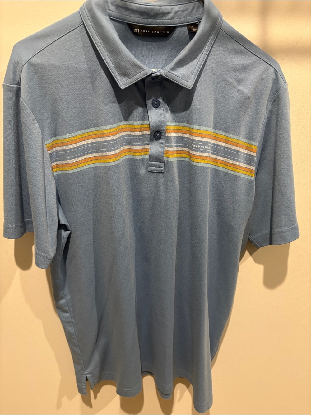 Travis Mathew Light Blue Polo with Yellow & White Stripes